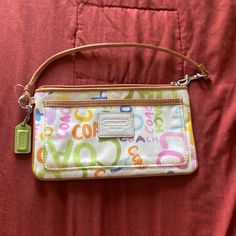 New Never Used Coach Small Purse/ Wristlet Coach Multicolor Wristlet, Multicolor Coach Wristlet For Daily Use, Coach Multicolor Pouch Wristlet, Coach Multicolor Wristlet For Everyday, Elegant Multicolor Wristlet For Everyday Use, Coach Mini Purse, Coach Clutch, Things I Wanna Buy, Wrist Wallet