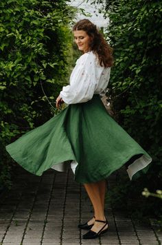 Embrace elegance with our Emerald Green Classic Skirt, a timeless piece that seamlessly blends style and comfort. The full-circle skirt exudes sophistication, while side seam pockets add a practical touch. Experience an easy fit with the stretch waistband, providing comfort all day long. The hidden back zip adds a sleek touch to this knee-length skirt, making it an ideal choice for both casual outings and semi-formal occasions. DRESS DESIGN FEATURES: * Full-circle skirt * Side seam pockets * Str Wedding Guest Skirt, Edwardian Skirt, Walking Skirt, Victorian Skirt, Skirt Linen, Classic Skirts, Wool Clothing, Rockabilly Dress, Full Circle Skirts