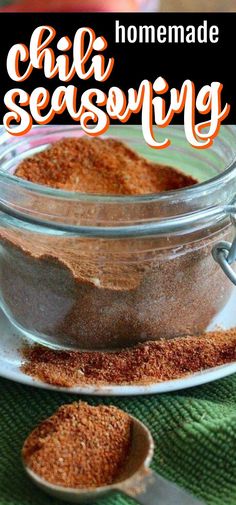 homemade chili seasoning in a glass jar with spoons on the side and text overlay that reads homemade chili seasoning