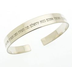 Have a look my beautifully handcrafted personalized Hebrew bracelet, expertly handcrafted from polished 925 Sterling Silver. This exquisite cuff features an engraved message, showcasing Jewish heritage and blessings from the Torah or your customized text in Hebrew.  The adjustable open bangle allows for a perfect fit, and you can choose to have both sides custom engraved.  This thoughtful piece makes a cherished and meaningful Jewish gift, sure to be treasured forever.  Each bracelet comes gift Bible Jewelry, Personalized Cuff Bracelets, Quote Bracelet, Jewish Heritage, Bracelet Quotes, Bracelet For Her, Message Bracelet, Jewish Jewelry, Jewelry Quotes