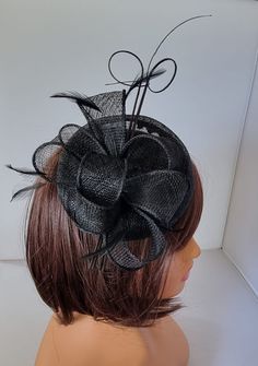 Black Fascinator With Flower Headband and Clip Wedding Hat,Royal Ascot Ladies Day Size: approx :- small size base  small Size  Material:-,Feathers,Sinamay ,Veil Note :- I can't accept return.. Thanks                                                          Customer's returns fascinator or other items  to me so shop will deduct shipping cost from refund  Which shipping cost shop will pay or paid for customer orders  Thank you Black Hat-style Headpieces For Wedding, Black Hat Headpiece For Wedding, Black Hat Style Headpieces For Wedding, Structured Crown Black Headpiece For Wedding, Black Structured Crown Headpiece For Weddings, Black Mini Hat For Wedding At Royal Ascot, Black Mini Hat For Kentucky Derby Wedding, Elegant Black Mini Hats As Gifts, Adjustable Black Headpiece For Royal Ascot