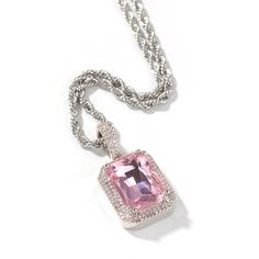 The Paved Gemstone Pendant features a large, emerald-cut central gemstone, available in various vibrant colors, surrounded by a bezel of sparkling clear stones. The luxurious design extends to the bail, also adorned with clear stones. Charm Size: 35mm x 18mm PVD Plated for a guaranteed long-lasting finish Crystal Pendant Jewelry With Stones, Pink Octagon Diamond Jewelry, Luxury Jewelry With Rectangular Cubic Zirconia, Pink Rectangular Stone Jewelry For Gift, Dazzling Rectangular Diamond White Jewelry, Dazzling Octagon Gemstone Jewelry, Elegant Rectangular Stone Jewelry, Dazzling Octagonal Gemstone Jewelry, Elegant Rectangular Jewelry With Stones