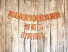 there is a sign that says firetrucks or bows on the side of a wooden wall