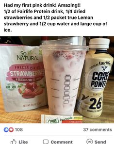 a blender with strawberries and ice cream in it next to a bag of yogurt