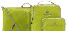 three pieces of lime green luggage with white handles and zippers on each side, one is