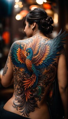 a woman with tattoos on her back