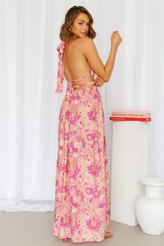 Length from bust to hem of size S: 130cm. Floral print maxi dress. Non-lined. Cold hand wash only. Model is a standard S and is wearing S.鈥/li>True to size. Non-stretchy and midweight fabric. Print placement may vary. Polyester. Experience true freedom in this piece, we guarantee you'll have No Cares at all! Featuring a long and flowy skirt with a silt and a tie-up halterneck as well as back ties. Style yours with sandals and waves. True Freedom, Floral Print Maxi Dress, Floral Print Maxi, Fabric Print, Flowy Skirt, Printed Maxi Dress, Floral Print, Floral Prints, Maxi Dress