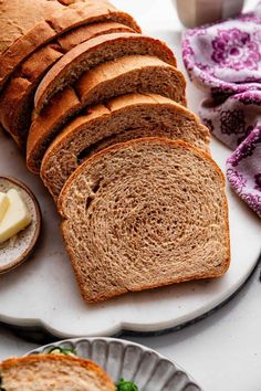 slices of bread and butter on a plate