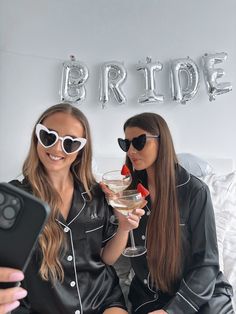 Gorgeous black personalised pyjamas Make your bridal party feel special with these elegant satin pyjamas. With the option for embroidered initials, these are the perfect gift for your bridal squad and will have them looking and feeling their best! The silky fabric feels luxurious against the skin, a must have for the morning of your wedding day! These pjs feature a button up collared top and bottoms with an elastic waistband making for a comfortable and flattering fit and the delicate piping adds a touch of sophistication. The initials will be embroidered above the pocket in white.  Available in short or long. Perfect for a bridal party Please leave your personalisation details Black Pyjamas, Personalised Pyjamas, Bridal Party Pajamas, Embroidered Pajamas, Satin Pyjamas, Bridesmaid Satin, Bridesmaid Pjs, Bridal Squad, Satin Nightwear