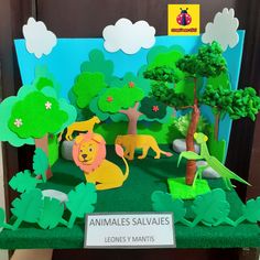 an animal themed display with paper cutouts on the front and back sides for children's play