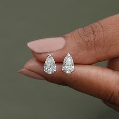 IGI Certified Pear Lab Diamond Stud Earrings / 0.50 to 5.00 TCW Pear Cut Man-Made Diamond Earrings / Dainty Solitaire Wedding Studs / Tear Drop Studs Available in Various Sizes / Lab Grown Diamond Solitaire Pear Studs Earrings / Baby Claws Prongs Studs / Minimalist Everyday Earrings ✥ SKU No.: IBE0094 ✥ 𝐌𝐚𝐢𝐧 𝐒𝐭𝐨𝐧𝐞 𝐃𝐞𝐭𝐚𝐢𝐥𝐬: ➻ Shape: Pear ➻ Weight:  0.50 TCW 1.00 TCW 1.50 TCW 2.00 TCW 2.50 TCW 3.00 TCW 3.50 TCW 4.00 TCW 4.50 TCW 5.00 TCW ➻ Color-Clarity: EF-VS ➻ Type: Lab Grown Dia Hypoallergenic White Diamond Earrings For Wedding, Hypoallergenic Teardrop Bridal Earrings For Anniversary, Pear Shaped Prong Setting Wedding Earrings, Pear-shaped Prong Setting Wedding Earrings, Classic Teardrop Earrings Gia Certified, Pear-shaped Earrings With Prong Setting For Wedding, Classic Gia Certified Bridal Earrings For Wedding, Hypoallergenic Diamond White Diamond Earrings For Wedding, White Diamond Cut Teardrop Earrings For Anniversary