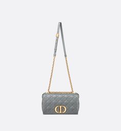 The Dior Caro Bag Combines Modernity With Timeless Elegance. The Medium Silhouette Is Crafted In Gray Calfskin With Cannage Topstitching. The Supple Bag Features A Flap Adorned With An Antique Gold-finish Metal 'cd' Twist Clasp, Inspired By The Seal Of A Christian Dior Perfume Bottle. The Detachable Chain Shoulder Strap With 'cd' Signature Links Allows The Bag To Be Carried By Hand Or Worn Over The Shoulder And May Be Replaced By One Of The House's Wide Embroidered Straps For Day Or Evening Atti Dior Caro Bag, Dior Perfume Bottle, Dior Caro, Christian Dior Perfume, Dior Perfume, Grey Stone, Womens Purses, Medium Bags, Perfume Bottle