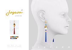 the earring is designed to look like a woman's head and features long tassels