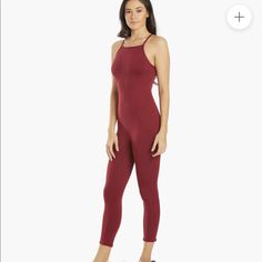 The Free People Ashford Side To Side Performance Jumpsuit Is A Grab-And-Go, One-Piece Option That Will Keep You Covered For Studio Workouts. Features High Neck Crisscross Straps Open Scoop Back Visible Seam Detailing Back Screen Printed Logo Details Fabric: 89% Polyester, 11% Spandex Style Features: Solid, Crisscross, Jumpsuit Cups: No Shelf Bra: No Support: Light Adjustable: No Length: Above Ankle Closure: Pull On Care: Machine Wash Cold Country Of Origin: Imported **Brand New Never Worn Store Fitted Burgundy Jumpsuits And Rompers, Youre A Peach, Free People Set, Free People Leggings, No Support, Cut Out Leggings, Leopard Leggings, Lace Leggings, Seamless Top