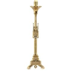 an ornate gold candle holder on a white background