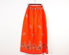 VIntage Orange Skirt High Waist Maxi Long Skirt Midi Floral Print Boho Skirt Cottage Chic Country Style Skirt Measurement:   Size is not labeled Waist: very stretchy, it would fit most of the women sized - S,M Length: 41" / 104cm N.B. Color may slightly differ from picture. Please check measurements to insure a proper fit. Remember to allow yourself some extra room for movement. You can compare these with something from your closet that fits you well. Condition: excellent vintage condition If you have any questions feel free to ask. SHIPPING * Items are shipped 1 - 2 business days after receiving the payment. * Friday night orders and Saturday orders are sent Monday morning. * I ship from Europe, so please allow 2 to 4 weeks for the package to arrive if you live overseas. * Europe 5 - 10 b Plaid Summer Dress, Bohemian Skirt, Boho Skirt, Pleated Long Skirt, Orange Skirt, Skirt High Waist, Style Rock, Long Maxi Skirts, Boho Skirts