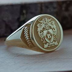 Luxury Engraved Ring With Coat Of Arms For Gift, Classic Customized Round Jewelry, Customized Classic Round Jewelry, Adjustable Hallmarked Signet Ring As Gift, Heirloom Style Adjustable Signet Ring As Gift, Adjustable Heirloom Signet Ring For Gift, Adjustable Heirloom Style Signet Ring Gift, Symbolic Engraved Ring With Engraving Option As Gift, Vintage Personalized Rings For Gifts