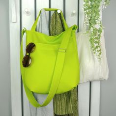 If you're looking for a large, bold and expressive hobo bag for yourself, this lime green 3in1 vegan leather purse is just for you. You can carry it in your hand, as shoulder tote or as crossbody purse. It's multifunctional, durable and roomy. Fits everything you need inside. 100% vegan. DETAILS shown: color: lime green pattern: 3in1 bag size: large size width: 28-32 cm + 8 cm sides and bottom/ 11- 12,5 in + 3 in sides and bottom height: 40 cm / 15, 5 in adjustable crossbody strap: 65-125 cm / 2 Large Crossbody Purse, Cross Shoulder Bags, Summer Tote Bags, Hobo Crossbody Bag, Green Handbag, Hobo Bags, Orange Bag, Leather Hobo Bag, Green Pattern