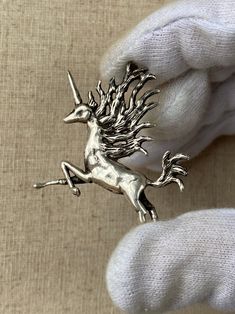 Incredibly Rare Vintage Signed Piece by Artist Carl Tasha (1943-2006). Art Nuevo Modernist Brutalist Figural Sterling Silver Unicorn pendant. Circa 1970s. Very Likely a One-Off or Special Edition by the artist. 2 x 2 inches  Weighs 14.4 grams  Signed on Underbelly Tested as 925 sterling silver Sterling Silver Chain can be added upon request (based on availability) for an additional cost. Want to make an offer? Message me!  Shopping vintage is a great way to conserve resources and help protect th Art Nuevo, Vintage Unicorn, Unicorn Tattoos, Unicorn Jewelry, Unicorn Pendant, Vintage Shopping, Unicorn Art, Art Nouveau Jewelry, Horse Art