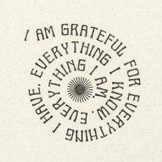 the words are written in black and white on a piece of paper that says i am grateful everything is here