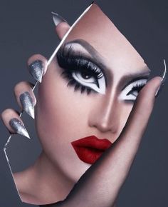 a woman's face is shown through a hole in the paper with nails on it