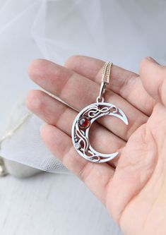 ITEM DESCRIPTION: The size of this circle pendant H 4 cm x W 3 cm. Weight - 4g. You can buy this necklace with a chain or without and with different stones. Jewelry will come to you in a gift box - ready for gift giving. I made this moon necklace of sterling silver, red garnet, and tiny labradorite. I think this color combination is very elegant and luxurious! The parcel will be sent 1-2 days after payment. Delivery usually takes 10-21 days. But in the period from December to February this may t Celestial Moon-shaped Birthstone Jewelry, Celestial Crescent Jewelry With Birthstone, Celestial Moon Shaped Birthstone Jewelry, Bohemian Moon Shaped Birthstone Jewelry, Sterling Silver Moon Charm Pendant Necklace, Sterling Silver Pendant Necklace With Moon Charm, Mystical Round Moon Charm Jewelry, Sterling Silver Moon Charm Pendant, Sterling Silver Sun And Moon Round Necklace