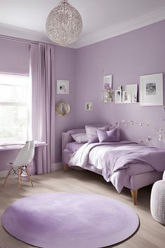 a bedroom with purple walls and furniture in the corner, including a round rug on the floor