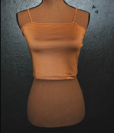 this ain't your regular mesh top we took it up a notch with the embossed bucking horses. it so easy to style with and just takes any outfit up a notch. saddle mesh l/shas stretch.running true to size.model is a small wearing a SMALL. 90 POLYESTER10 SPANDEX Fitted Crop Top Tank For Fall, Sporty Stretch Brown Tops, Sporty Brown Stretch Top, Sporty Brown Tops For Fall, Brown Stretch Workout Top, Brown Summer Workout Tops, Fitted Brown Workout Tops, Sporty Brown Tops For Spring, Fitted Brown Basic Crop Top