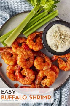 shrimp and celery on a plate with ranch dressing