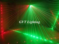 green and red laser light show with the words gvt lighting on it's side