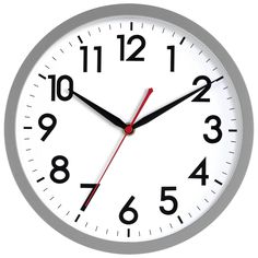 a white clock with red hands and numbers on the face shows eleven o'clock