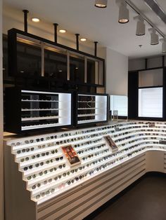 an eye store with rows of glasses on display