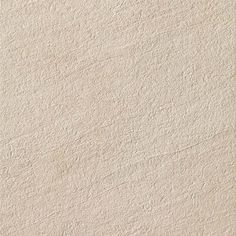 a white wall that is very textured and looks like it could be used as a background