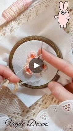 a video demonstrating how to make an origami dream catcher