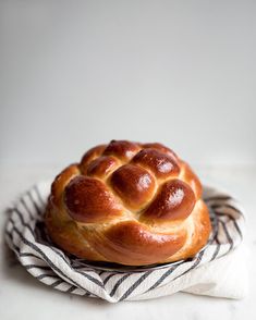 a hot cross bun sitting on top of a towel