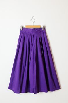 "Vintage Purple Cotton Midi Skirt from 80's. Measurements Total Length: 29 1/2\" Waist             : 23\"  Hips               : Free Condition     : Gently used. There`s no stains or holes. Good condition.  ※Please read the policy before you purchase※" Vintage Long Gathered Skirt Bottoms, Vintage Long Skirt With Relaxed Fit, Vintage Long Gathered Skirt, Vintage Gathered Midi Skirt, Vintage Cotton Flared Skirt Bottoms, Vintage Cotton Flared Skirt, Vintage Flared Lined Skirt, Vintage Purple Lined Skirt, Vintage Cotton Midi Skirt