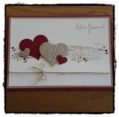 a close up of a card with hearts on it