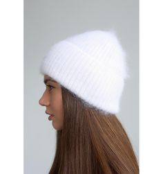 Angora fluffy beanie is stylish and so cute. It is warm, soft and so cozy! COMPOSITION OF YARN: 70% real angora, 20% merino wool, 10% acrylic. It's high quality yarn, Soft and comfy and looks good. Produced in Italy. CARE: only hand wash in cold water (max. 86ºF / 30ºC) and flat dry. Made in a smoke free home. Have a nice shopping! Fluffy Beanie, Hat Knit, Warm Winter Hats, Winter Cap, Hat Women, Gift For Daughter, White Hat, Winter Beanie, Skull Cap Beanie