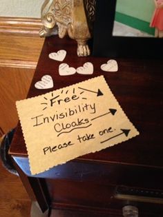 a piece of paper that has been placed on top of a piano with hearts drawn on it