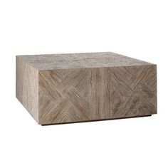 a wooden box sitting on top of a white floor next to an object that looks like a herringbone pattern