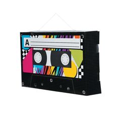 a clock made out of a cassette tape