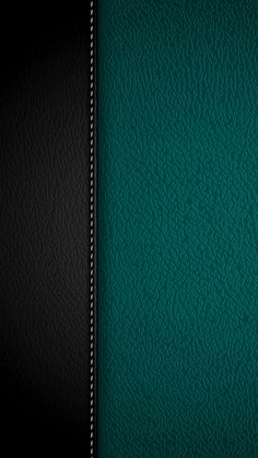 a black and green leather background with stitching