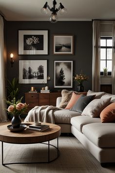 a living room filled with lots of furniture and pictures on the wall above it's coffee table