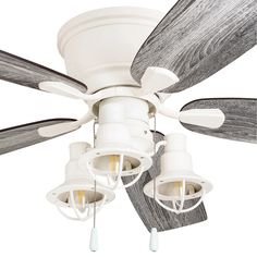 a white ceiling fan with three light bulbs on each of it's four blades