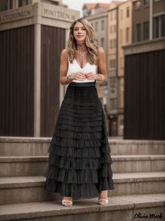 Olivia Mark - Chic Mesh Cake Skirt Layered Party Skirt, Chic Tiered Maxi Skirt For Party, Black Tiered Tulle Skirt, Chic Tiered Lined Skirt, Chic Layered Party Bottoms, Elegant Layered Tiered Skirt, Layered Summer Party Bottoms, Chic Tiered Layered Skirt, Layered Party Bottoms For Summer