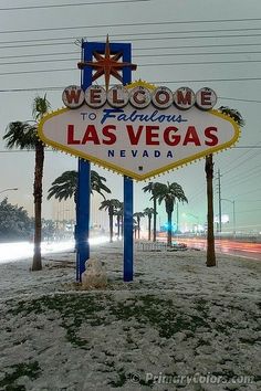 the welcome to las vegas sign is covered in snow