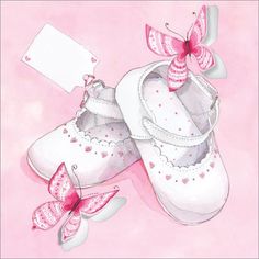 a pair of white baby shoes with pink bows and hearts on them, next to a blank card