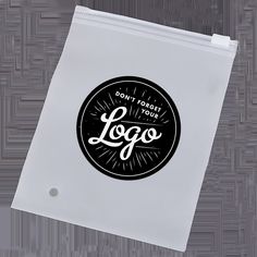 a white bag with the words don't forget your logo printed on it