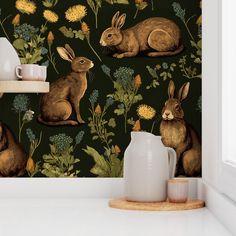 a wallpaper with rabbits and flowers on it