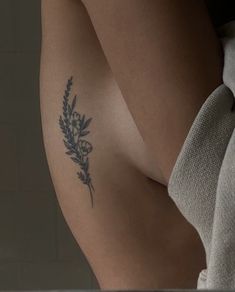 a close up of a person's arm with flowers on it